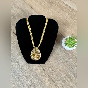 Olive coloured medallion necklace